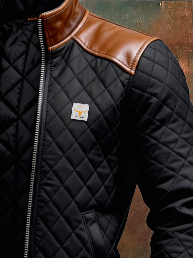 CHAQUETA NEGRA DE PIEL ARTIFICIAL CON HOMBROS ARTIFICIALES